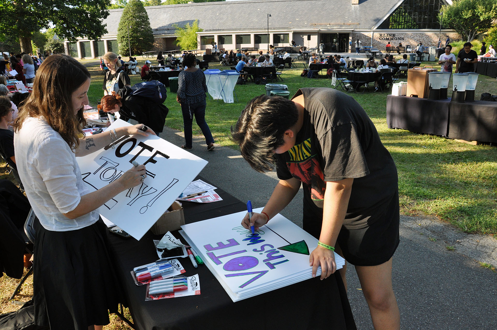 Bard students and staff make voting signs at a campus community event. Photo by Jonathan Asiedu ’24