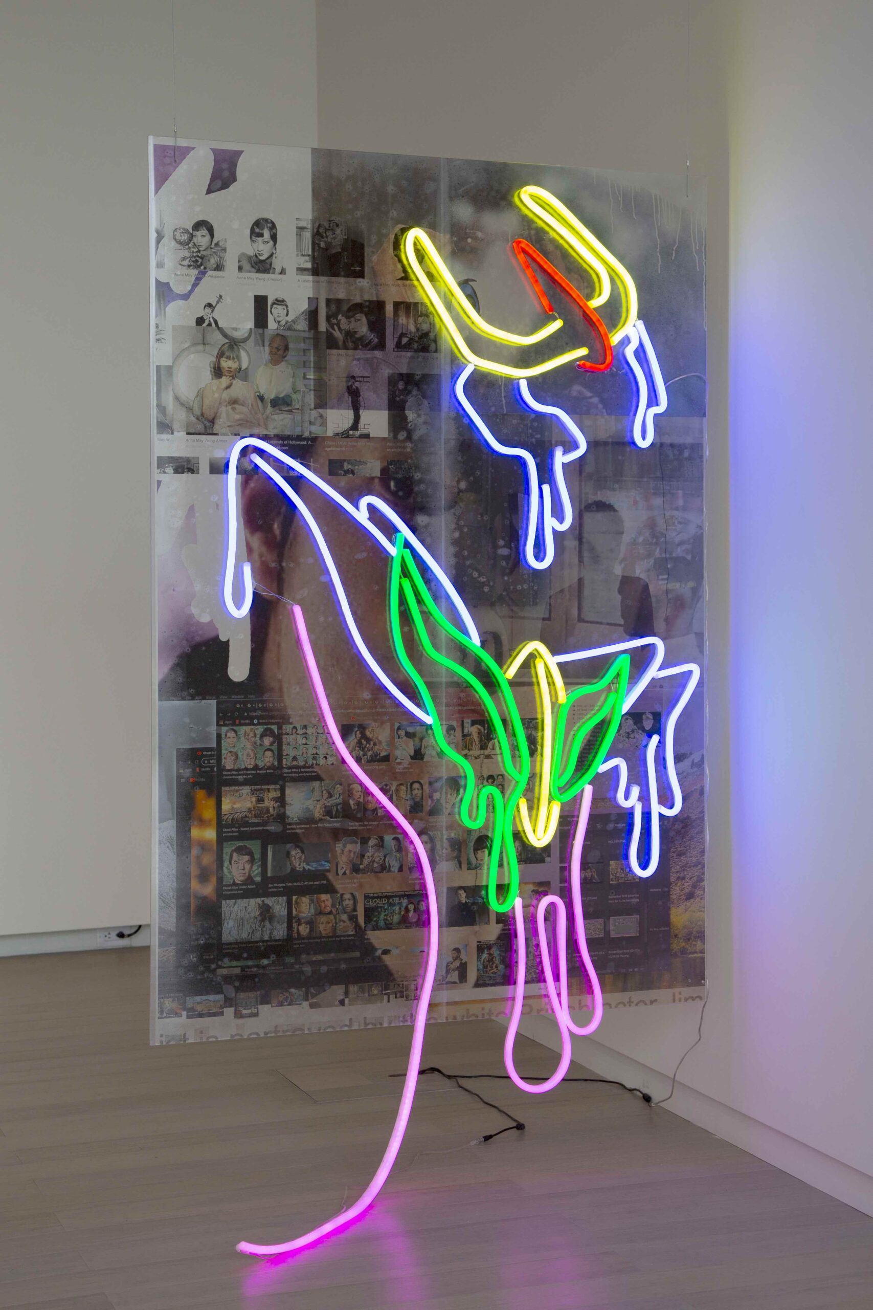 Sculpture in colorful neon, collage, gallery white walls