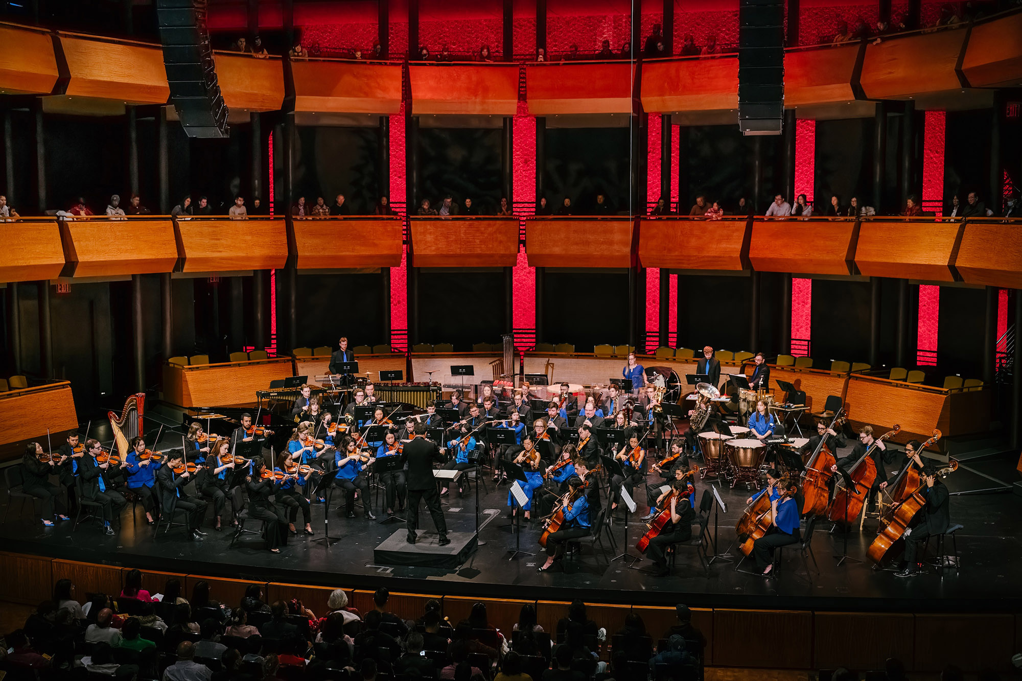 Jindong Cai conducts The Orchestra Now onstage at Jazz at Lincoln Center.