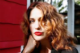 A professional portrait of Lola Kirke '12.