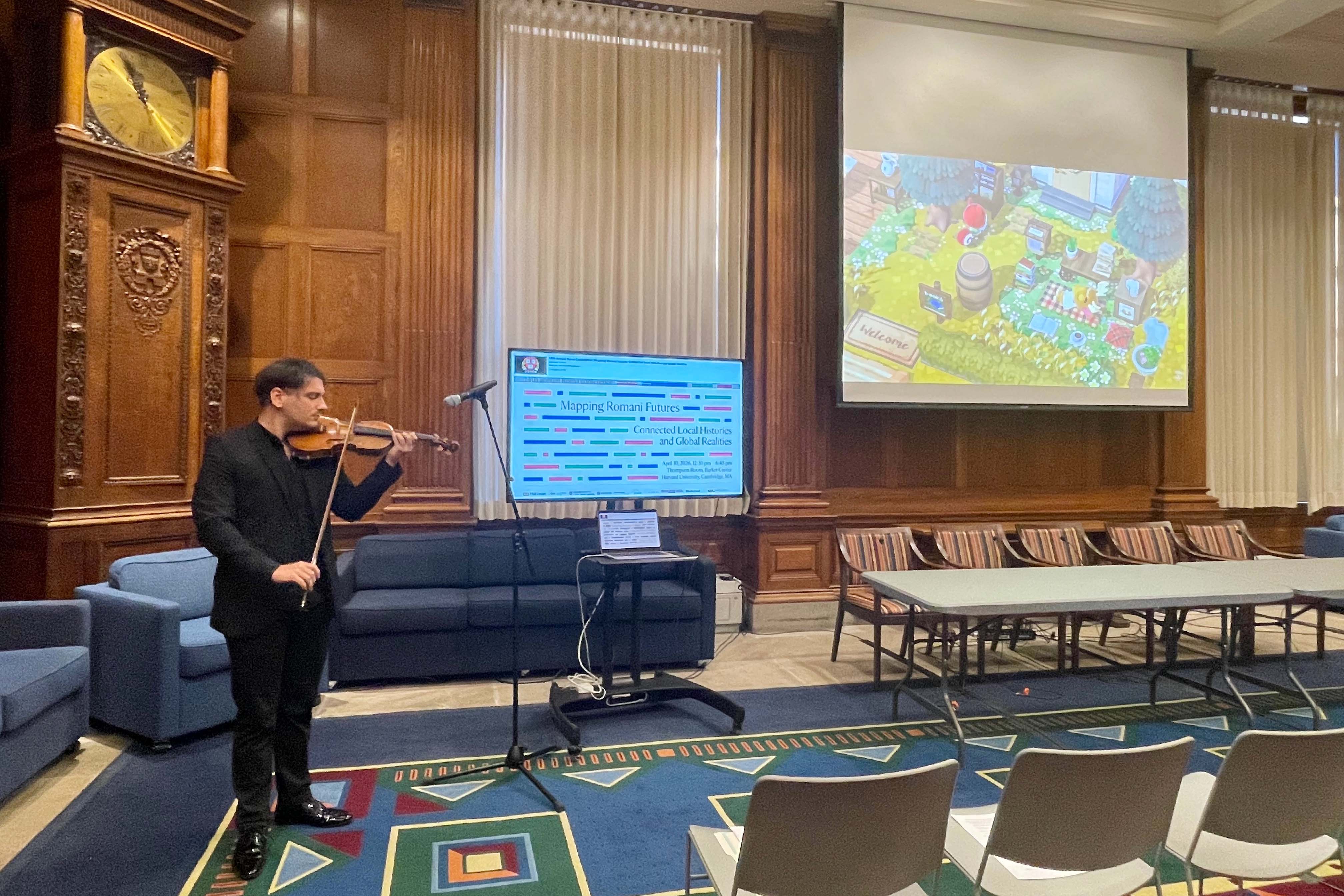 Sandor Burka &rsquo;27 playing violin at the&nbsp;14th Harvard Roma Conference.