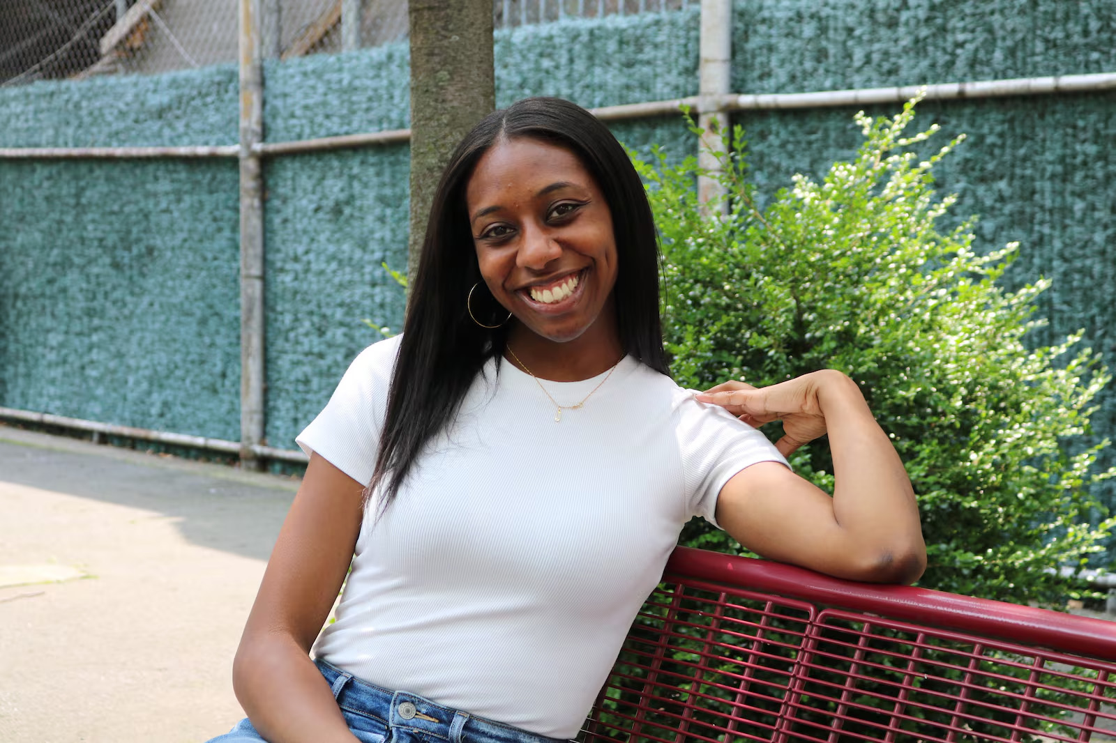 Jasmine Coombs smiling in a professional photo.