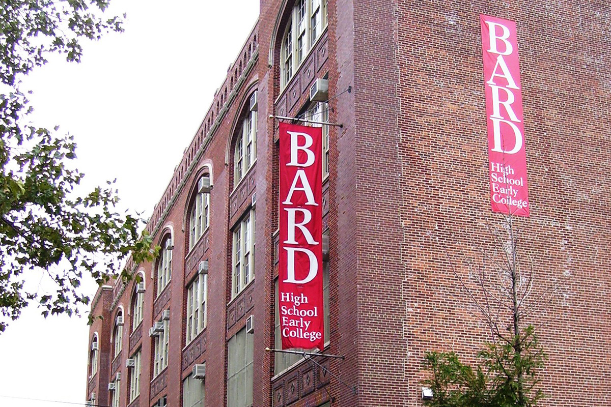 A building showing banners for BHSEC Manhattan.