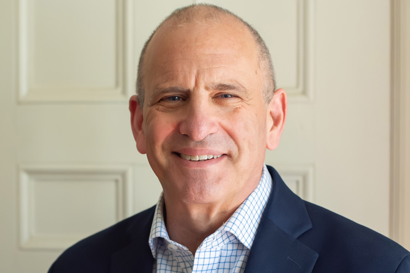 A professional photograph of Jonathan Becker