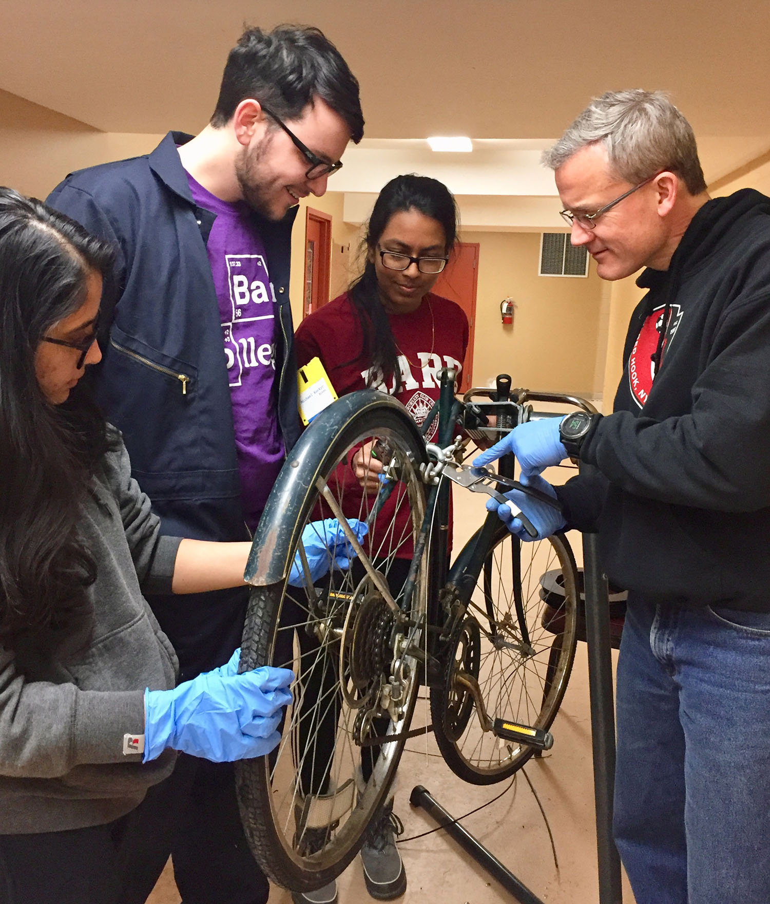 At the Repair Cafe in Red Hook, Bard students and local volunteers fix bicycles.