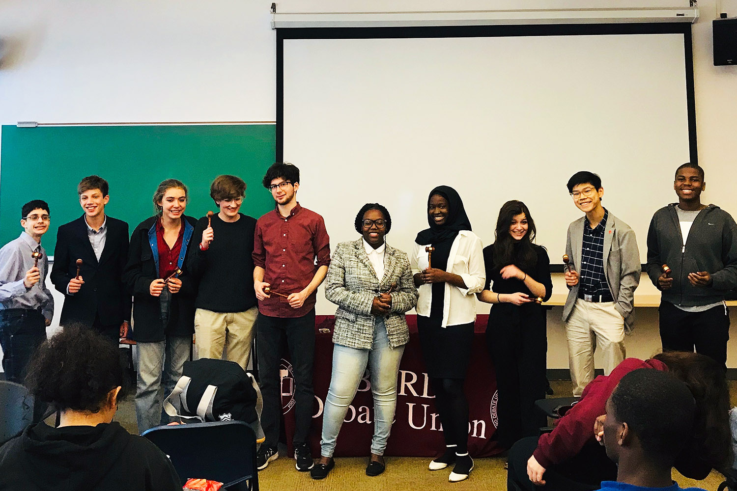 The top 10 speakers at the Early College Debate Tournament are recognized at the closing awards ceremony.