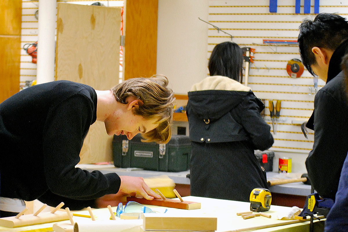Woodworking at the Red Hook Repair Cafe at the Community Center.