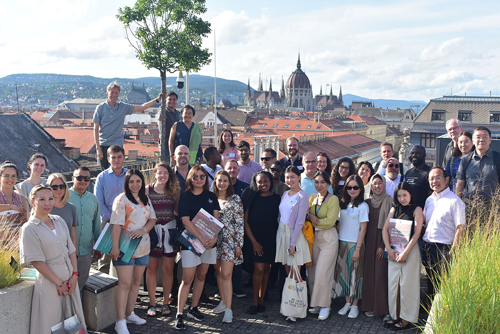 Participants in the Geospatial Technologies workshop gathered for a group portrait at the Central European University campus this summer. Photo by Geohubs.