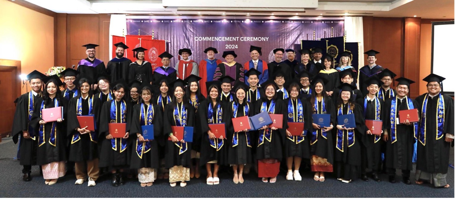 Parami University&rsquo;s first graduation: students displaying Bard and Parami degrees (Chaing Mai, Thailand)