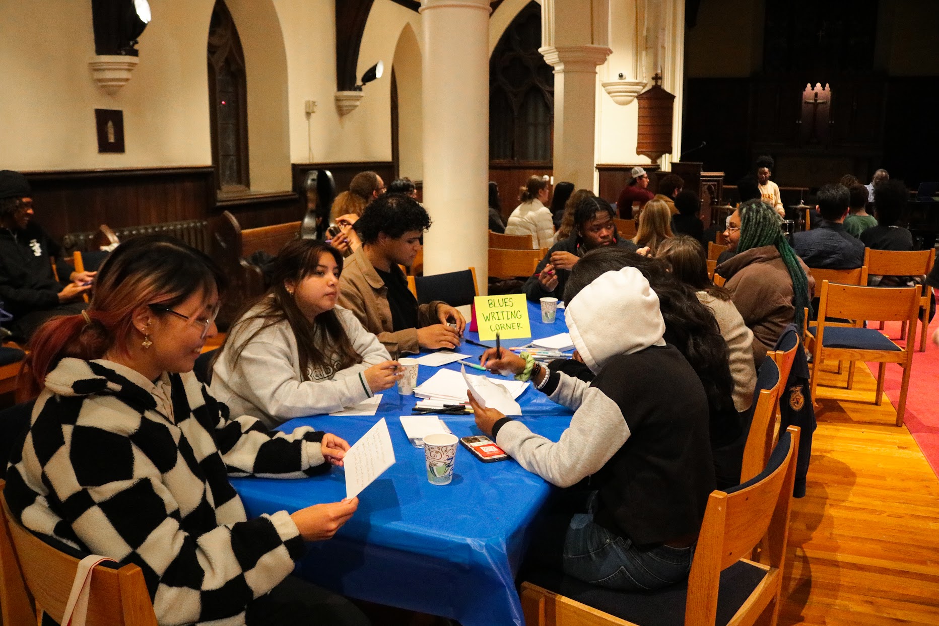 Participants craft their Blues lyrics using the classic AAB structure, sharing personal stories and emotions. Photo by&nbsp;Anna Bilyk &lsquo;27